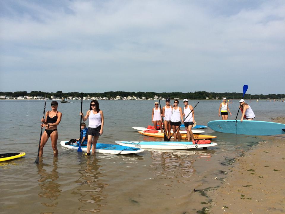 Moms Rock The River people having fun on paddle boards