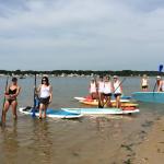 Moms Rock The River people having fun on paddle boards