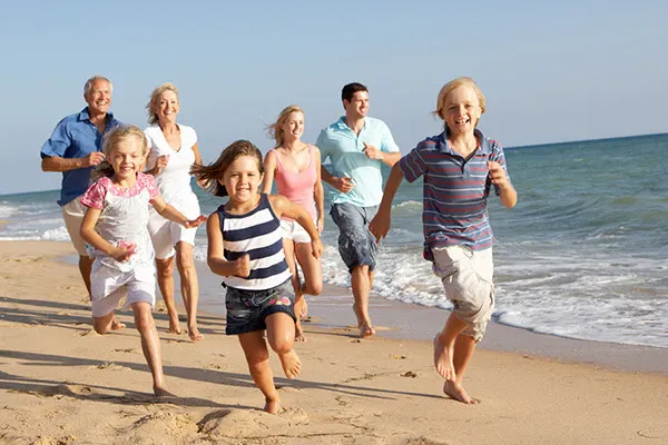 Family Running on the beach