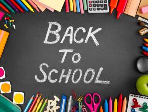 back to school text surrounded by school supplies