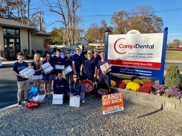 The team working at the candy buyback program