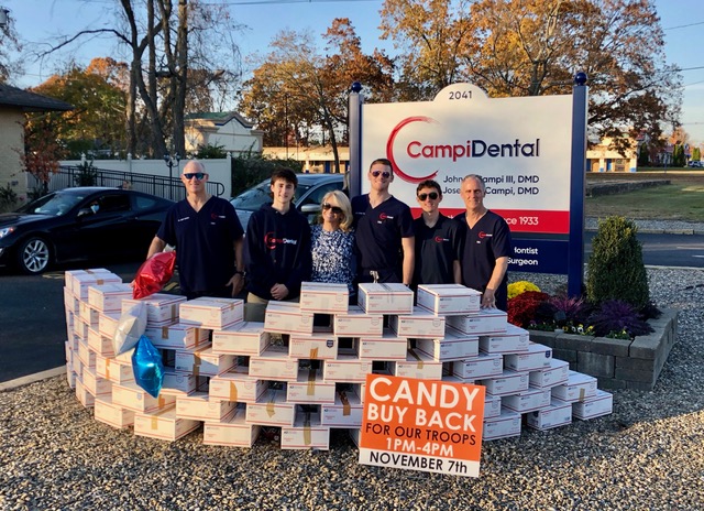 The team working at the candy buyback program