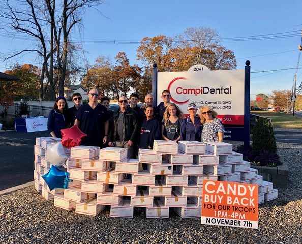 The team working at the candy buyback program